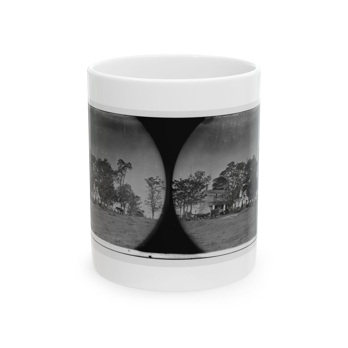 Black and white stereograph pair showing a farmhouse, trees and horses across a bare dirt field.