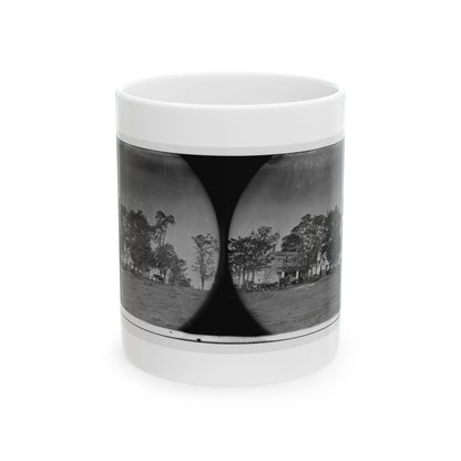 Black and white stereograph pair showing a farmhouse, trees and horses across a bare dirt field.