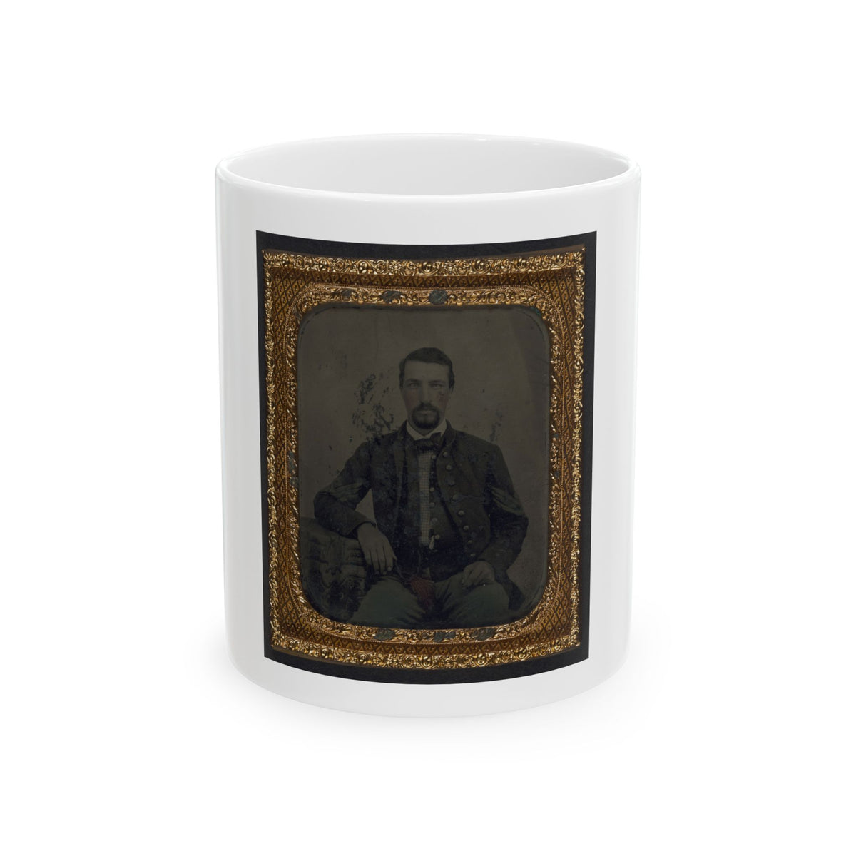 Hand-tinted tintype of a seated bearded man in a buttoned jacket, set in an ornate gold diamond-pattern case frame.