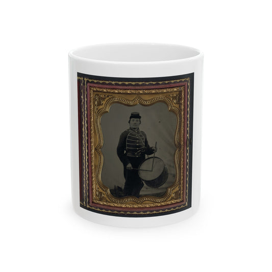 Antique tintype of a uniformed drummer in a kepi, standing beside a snare drum, in a scalloped gilt case.