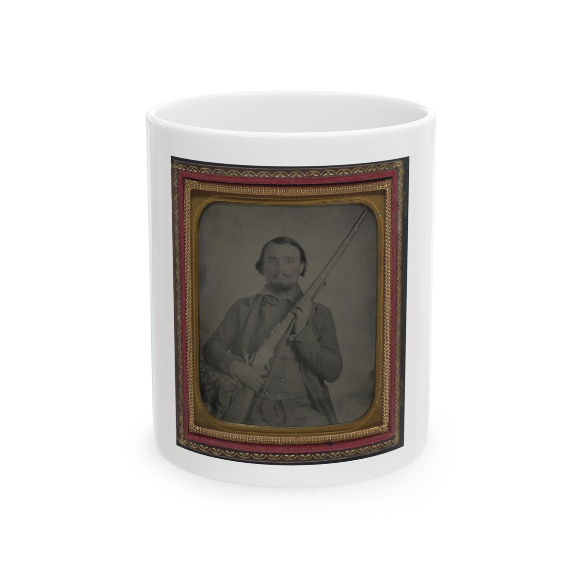 Sepia-toned ambrotype of a bearded man holding a rifle upright, set in a gilt and red velvet case.
