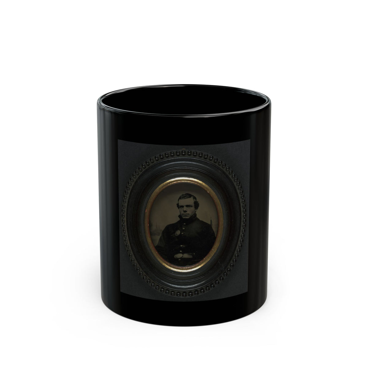 Sepia tintype portrait of a man in a dark coat inside a black oval beaded frame with a gilt inner mat.