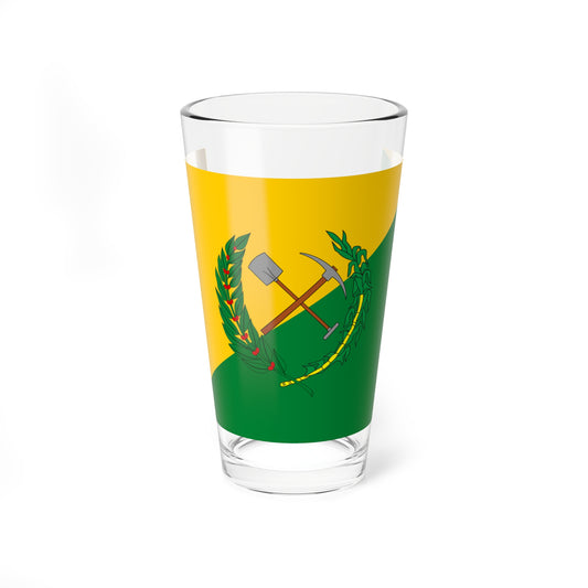 Diagonal yellow and green flag with a central wreath of coffee and sugarcane around crossed shovel and pickaxe.