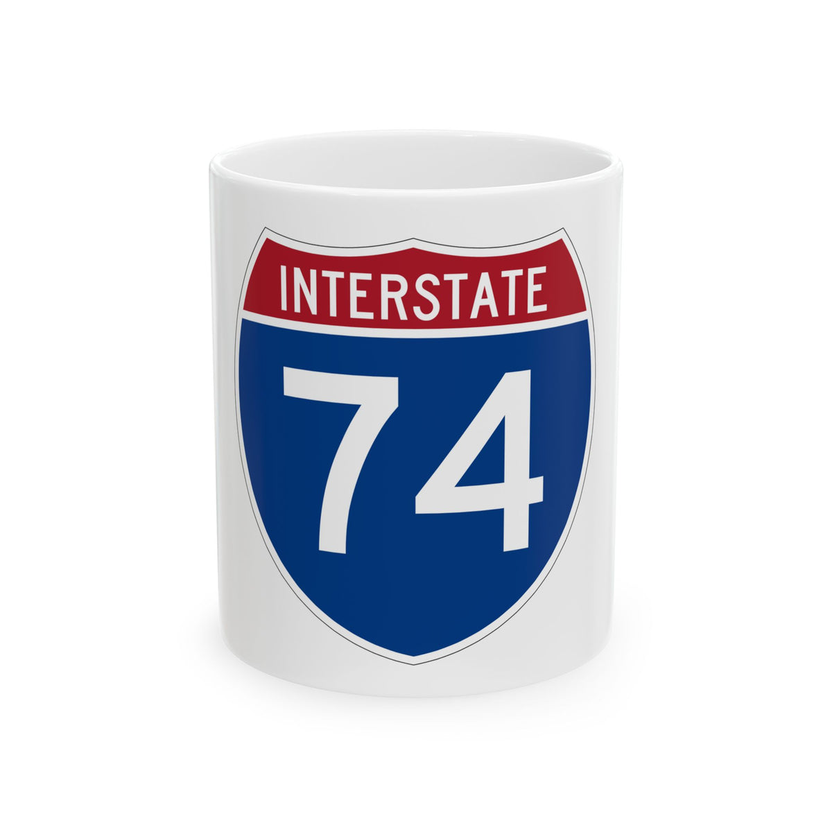 Flat vector US Interstate 74 highway shield with white INTERSTATE lettering above the number 74 on a navy blue field.