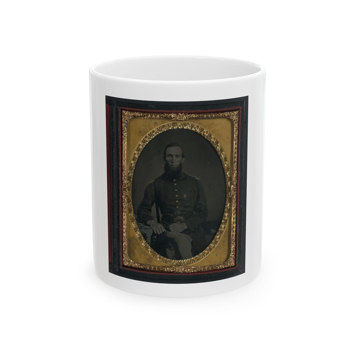 Sepia tintype of a seated bearded soldier in a dark uniform jacket, set in an oval embossed gilt frame.