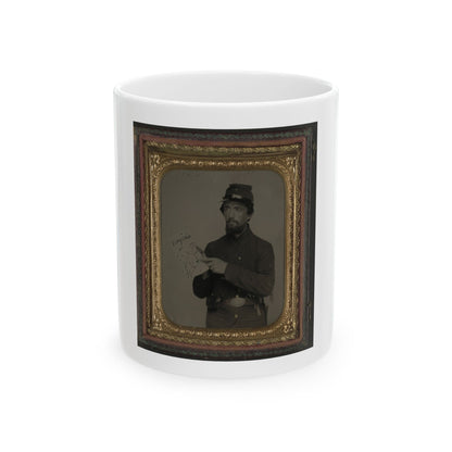 Antique tintype of a bearded soldier in a kepi holding a hand-drawn map labelled Virginia, in an ornate gold frame.