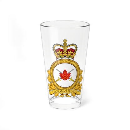 Gold rope-edged military badge with a red maple leaf and crossed swords, topped by a crown and motto ribbon.