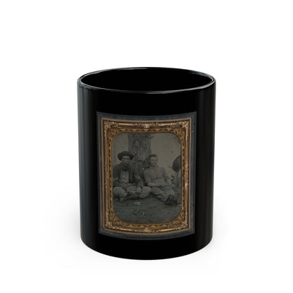 Antique tintype of two men seated outdoors by a tree, one in a wide-brimmed hat and one in shirtsleeves, in gilt.