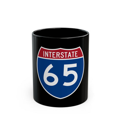 Blue Interstate 65 shield with a red band reading INTERSTATE and the number 65 in large white digits.