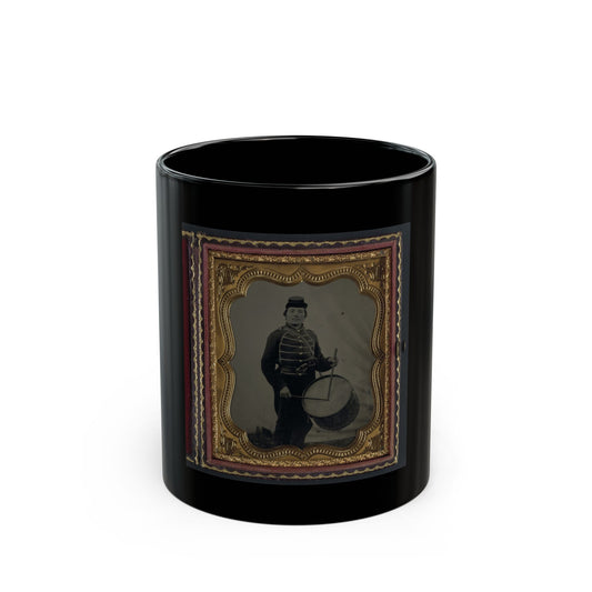 Antique tintype of a uniformed drummer in a kepi, standing beside a snare drum, in a scalloped gilt case.