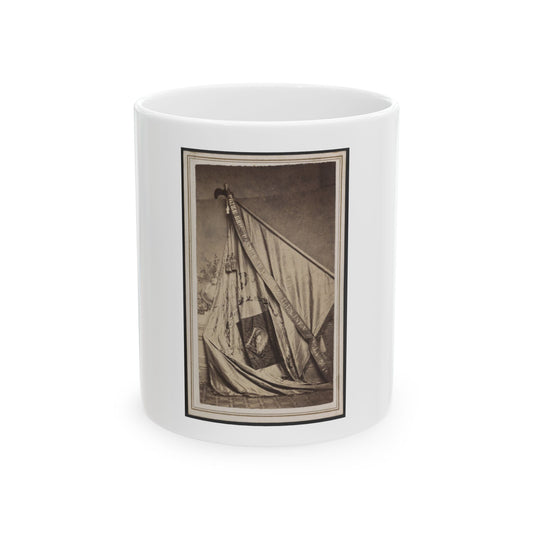 Sepia print of a draped silk banner on a flagstaff, with a ribbon reading PRIZE BRIG. BANNER.