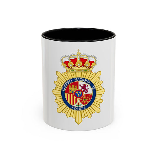 Gold sunburst police badge with a crown on top, a quartered heraldic shield and lettering on a navy ring.