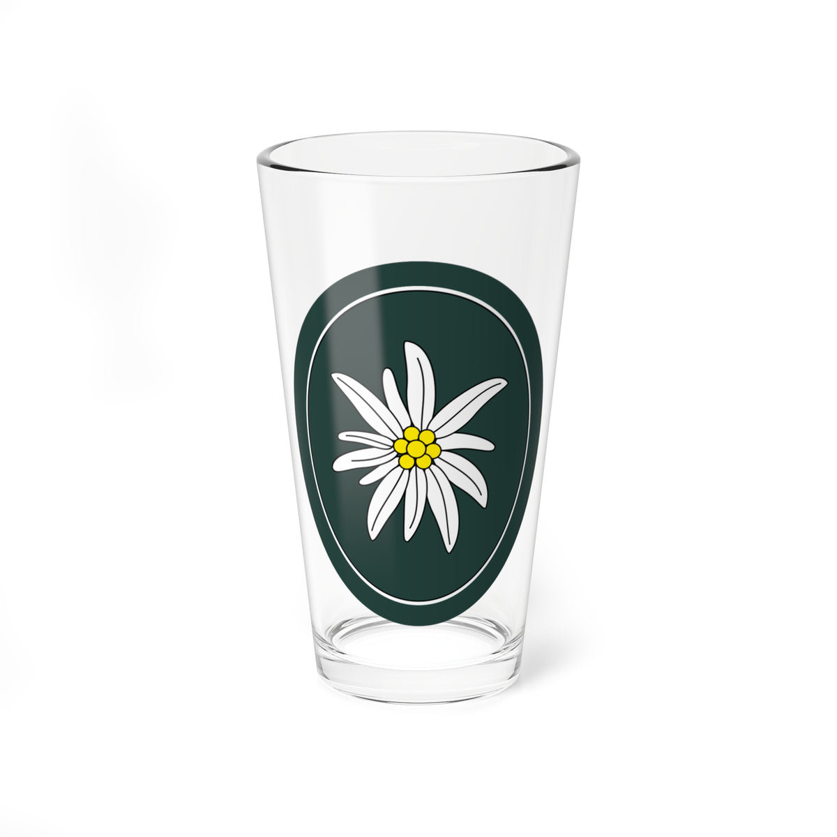 White edelweiss flower with a yellow centre on a dark green oval badge with a thin white inner ring.