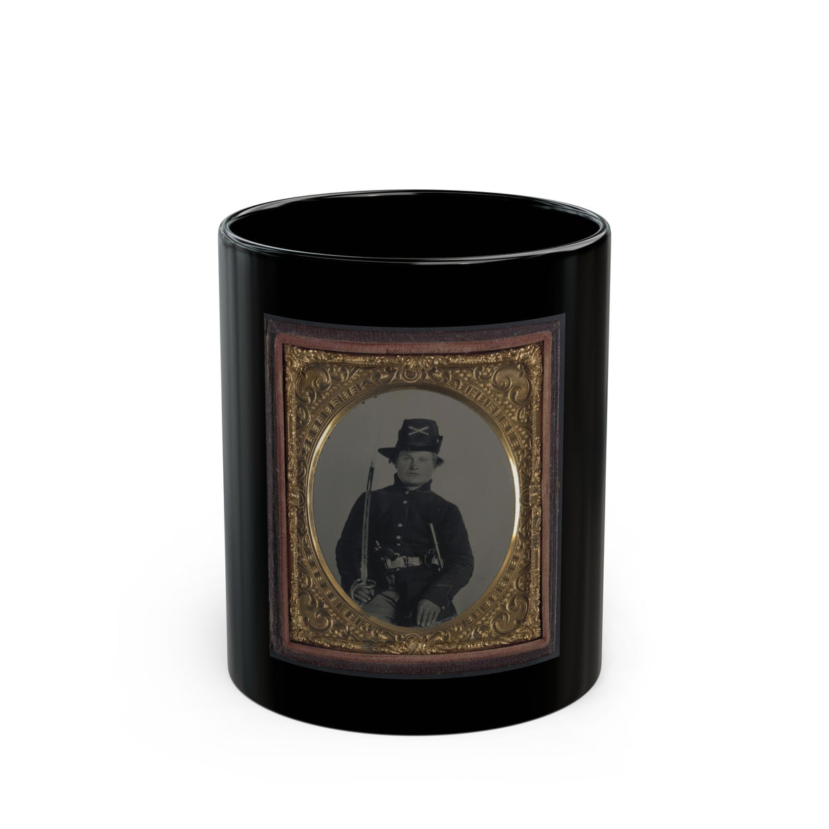 Monochrome tintype of a Civil War soldier with a sabre and crossed-sabre hat badge, set in an ornate gilt frame.