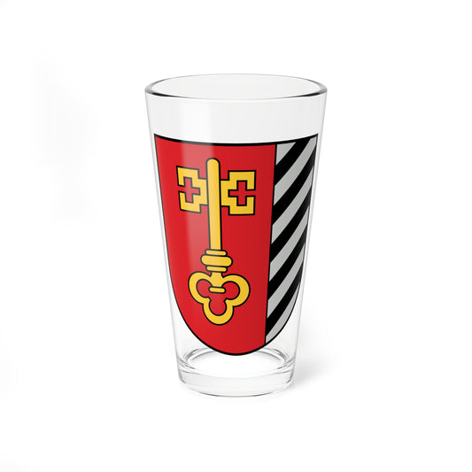 Red and striped heraldic shield with a large gold key bearing a cross-shaped bit, outlined in black on white.