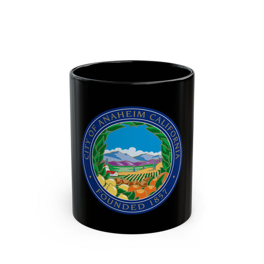 Navy circular seal of Anaheim showing citrus groves, a farmhouse and blue mountains, lettered around its rim.