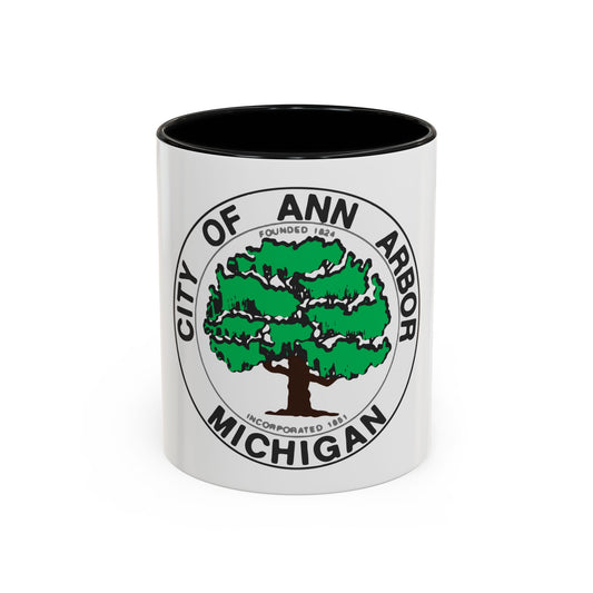 Circular municipal seal reading City of Ann Arbor, Michigan, centred on a green tree with a brown trunk.