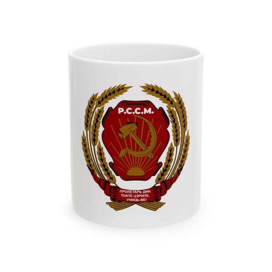 Red shield with a gold hammer and sickle over a sunrise, framed by a gold wheat wreath and red Cyrillic ribbon.