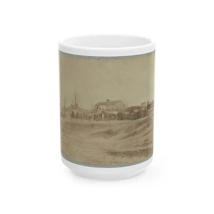 A Camp Made Up Of Small Cabins That Surround A Large Building (U.S. Civil War) White Coffee Mug 15oz - Go Mug Yourself