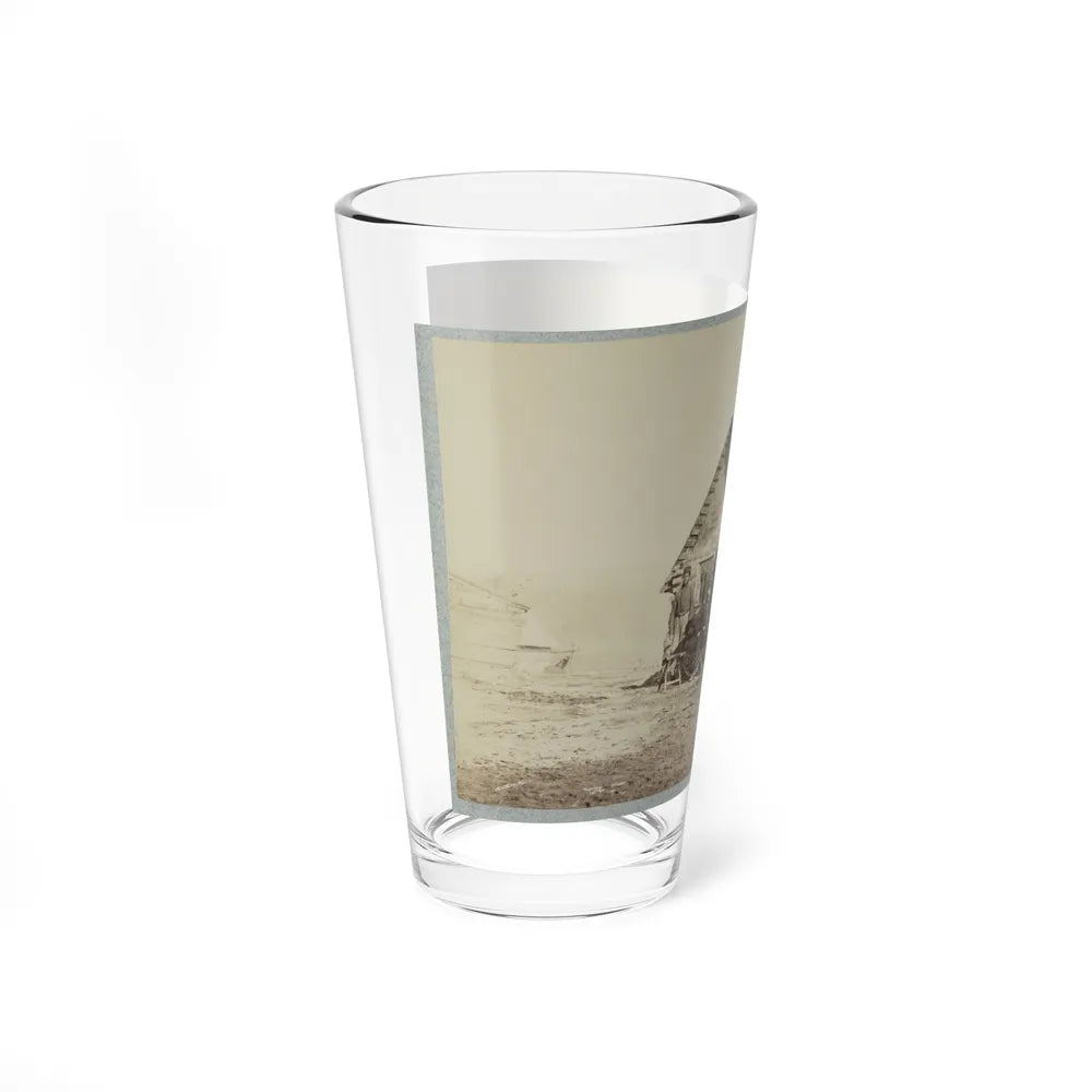 A Group Of Soldiers, And Two Young Men, One An African American, Stand Outside Of Log Cabin Quarters (U.S. Civil War) Pint Glass 16oz-Go Mug Yourself