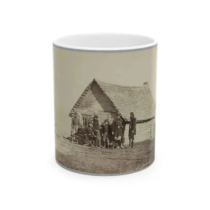 A Group Of Soldiers, And Two Young Men, One An African American, Stand Outside Of Log Cabin Quarters (U.S. Civil War) White Coffee Mug 11oz - Go Mug Yourself