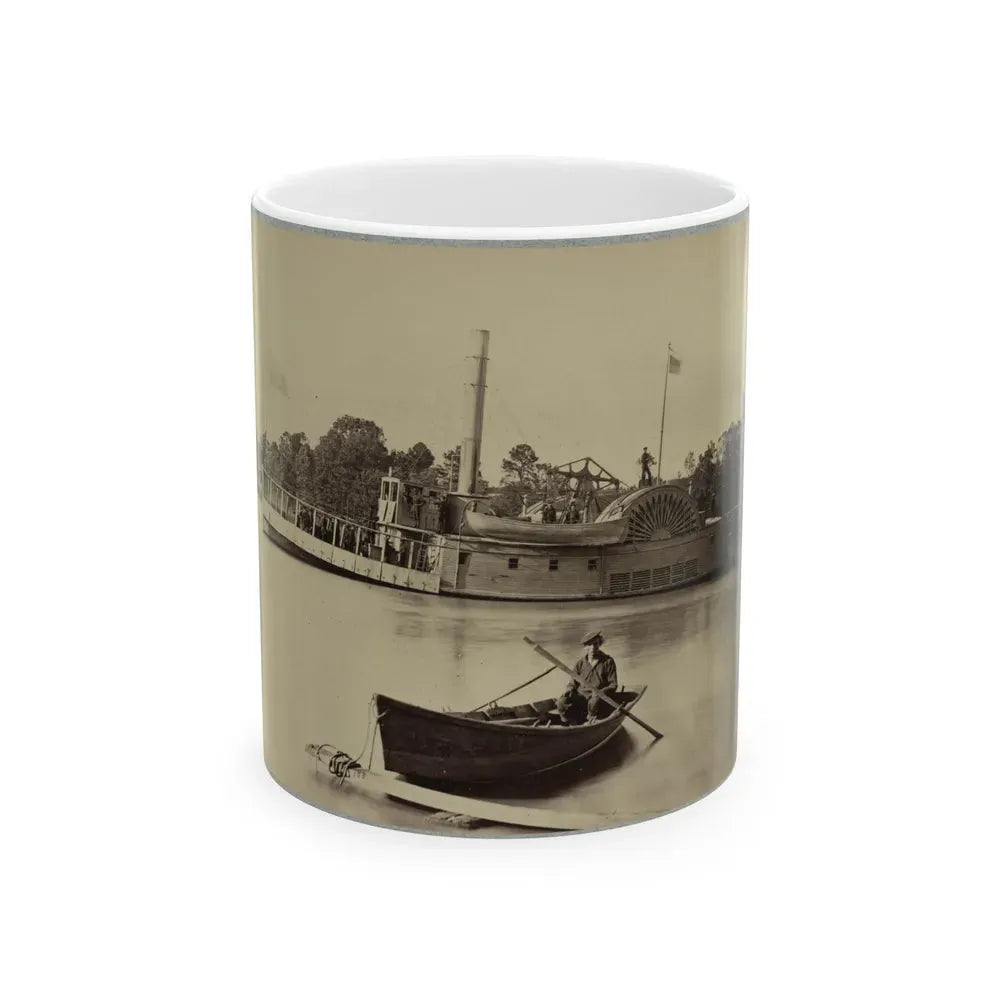 A Sailor Sits In A Small Boat In The Foreground With A Side Wheeler In The Rear (U.S. Civil War) White Coffee Mug 11oz - Go Mug Yourself