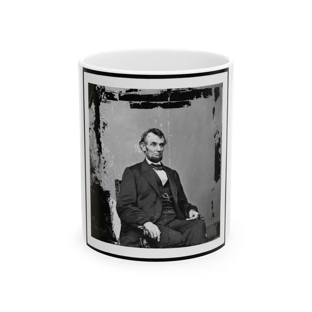 Abraham Lincoln, President Of The United States, Three-Quarter Length Portrait, Seated, Facing Right (U.S. Civil War) White Coffee Mug-11oz-Go Mug Yourself