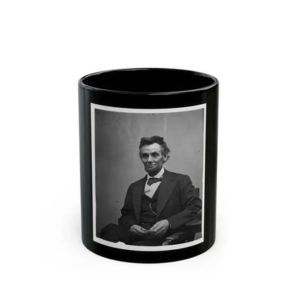 Abraham Lincoln, Three-Quarter Length Portrait, Seated And Holding His Spectacles And A Pencil (U.S. Civil War) Black Coffee Mug 11oz - Go Mug Yourself