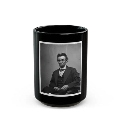 Abraham Lincoln, Three-Quarter Length Portrait, Seated And Holding His Spectacles And A Pencil (U.S. Civil War) Black Coffee Mug 15oz - Go Mug Yourself