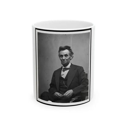 Abraham Lincoln, Three-Quarter Length Portrait, Seated And Holding His Spectacles And A Pencil (U.S. Civil War) White Coffee Mug 11oz - Go Mug Yourself