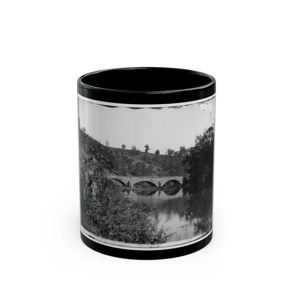 Antietam, Maryland. Antietam Bridge, Looking Down Stream (U.S. Civil War) Black Coffee Mug-11oz-Go Mug Yourself