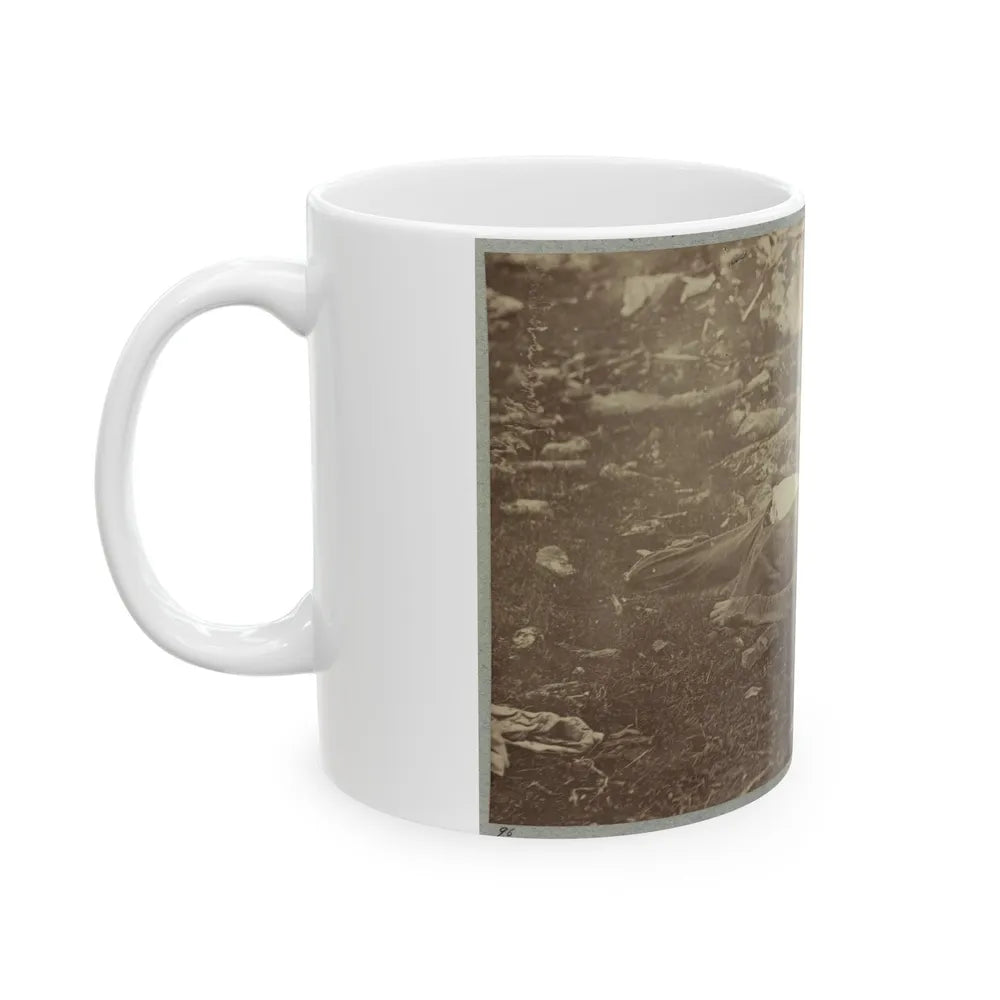 Battlefield Of Gettysburg. Dead Confederate Sharpshooter At Foot Of Little Round Top (U.S. Civil War) White Coffee Mug-Go Mug Yourself