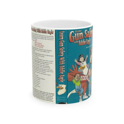 LEARN GUN SAFETY WITH EDDIE EAGLE HOSTED BY JASON PRIESTLEY STRANGE (VHS COVER) - White Coffee Mug 11oz - Go Mug Yourself