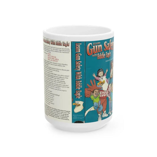 LEARN GUN SAFETY WITH EDDIE EAGLE HOSTED BY JASON PRIESTLEY STRANGE (VHS COVER) - White Coffee Mug 15oz - Go Mug Yourself