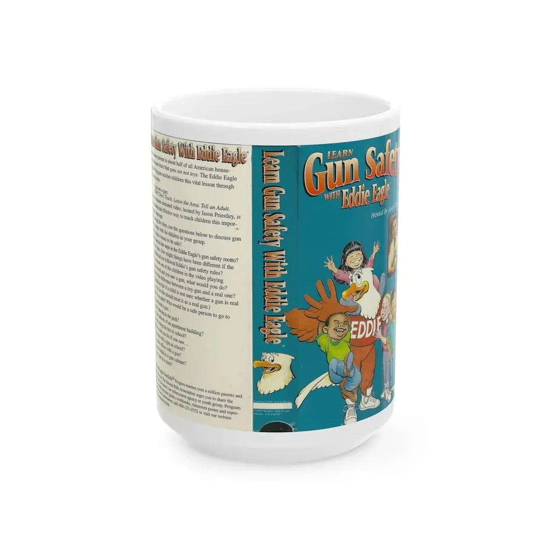 LEARN GUN SAFETY WITH EDDIE EAGLE HOSTED BY JASON PRIESTLEY (VHS COVER) - White Coffee Mug 15oz - Go Mug Yourself