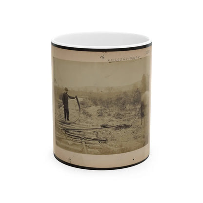 Military Railroad Operations In Northern Virginia Man Standing On Railroad Tracks Holding Twisted Rail (U.S. Civil War) White Coffee Mug-11oz-Go Mug Yourself