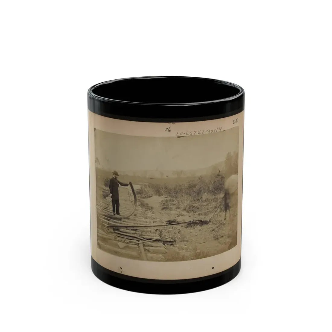 Military Railroad Operations In Northern Virginia  Man Standing On Railroad Tracks Holding Twisted Rail (U.S. Civil War) Black Coffee Mug 11oz - Go Mug Yourself