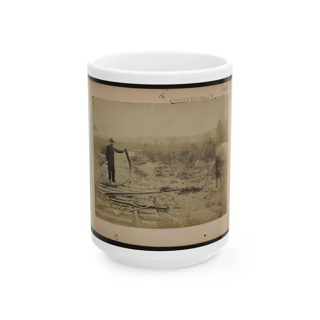 Military Railroad Operations In Northern Virginia  Man Standing On Railroad Tracks Holding Twisted Rail (U.S. Civil War) White Coffee Mug 15oz - Go Mug Yourself