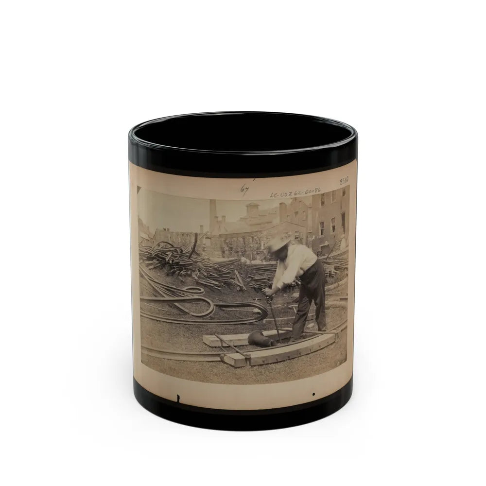 Railroad Construction Worker Straightening Track; Pile Of Twisted Rails In Background. 1862-63 (U.S. Civil War) Black Coffee Mug-11oz-Go Mug Yourself