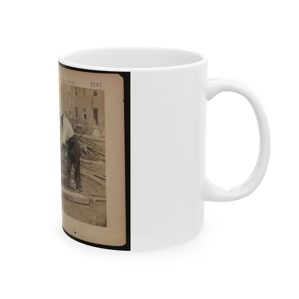 Railroad Construction Worker Straightening Track; Pile Of Twisted Rails In Background. 1862-63 (U.S. Civil War) White Coffee Mug-Go Mug Yourself