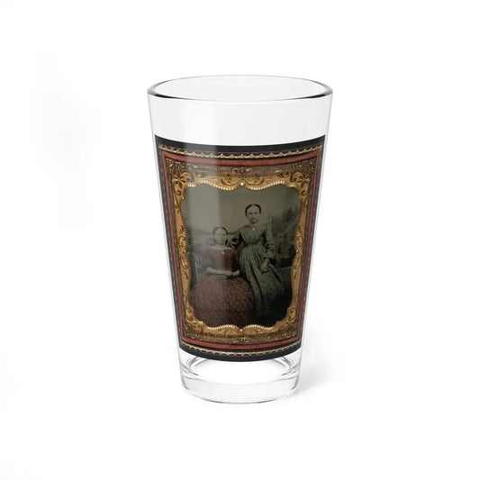 Two Unidentified Young Women Wearing Printed Dresses And Necklaces In Front Of Painted Backdrop Showing Plantation (U.S. Civil War) Pint Glass 16oz 16oz - Go Mug Yourself