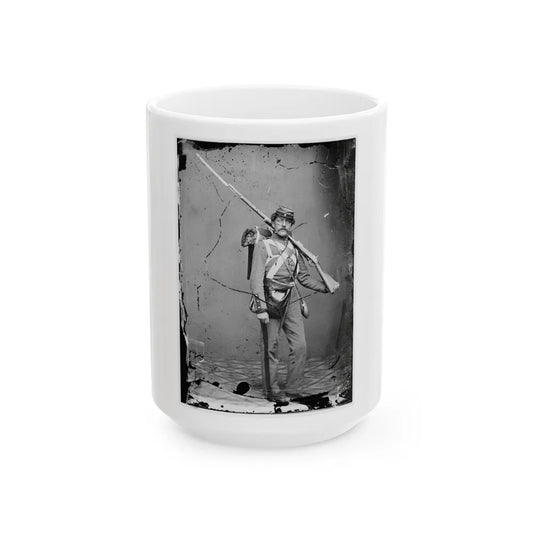 Unknown Location. Unidentified Union Volunteer With Shouldered Rifle And Bayonet In Photographer's Studio (U.S. Civil War) White Coffee Mug-15oz-Go Mug Yourself