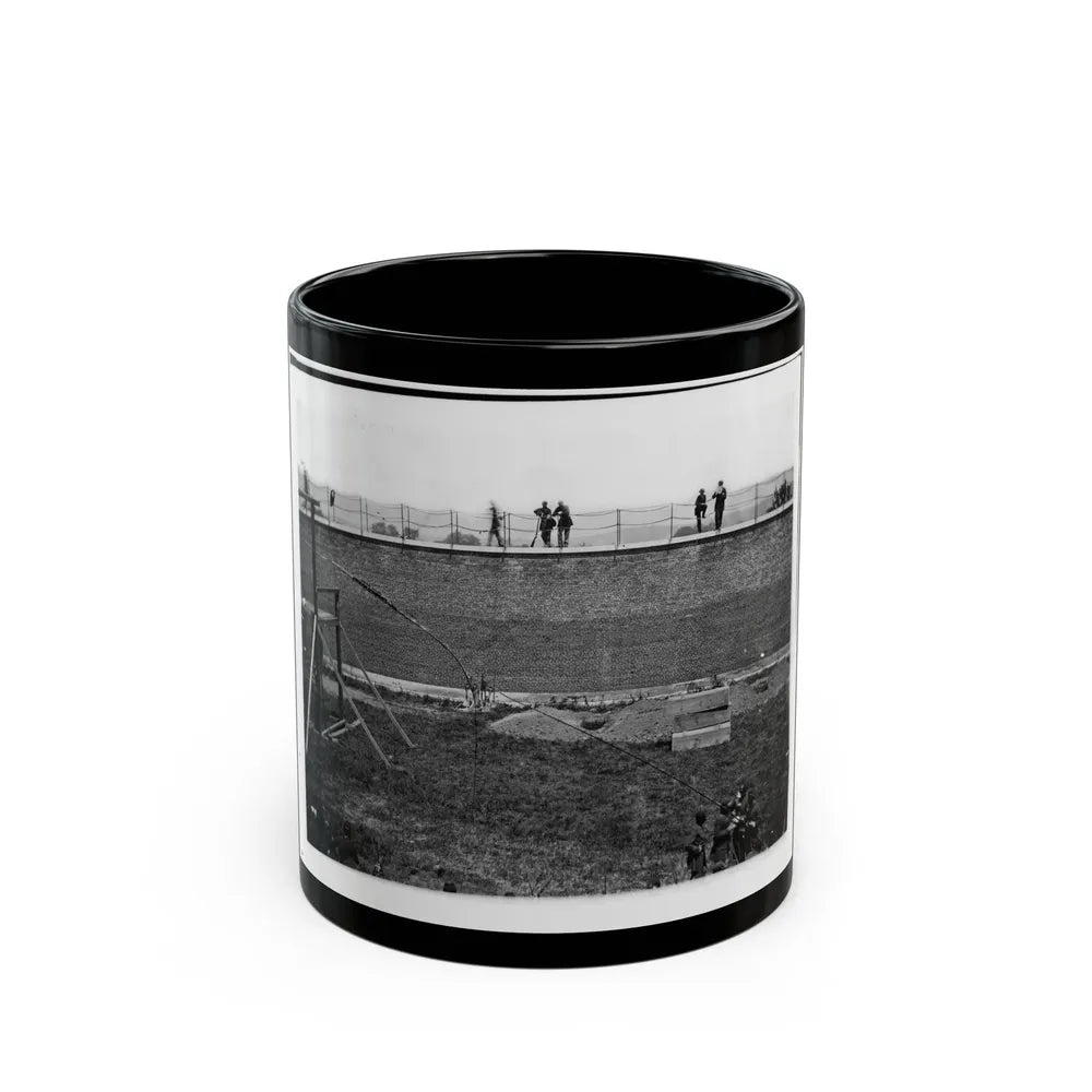 Washington, D.C. Coffins And Open Graves Ready For The Conspirators' Bodies At Right Of Scaffold (U.S. Civil War) Black Coffee Mug-11oz-Go Mug Yourself