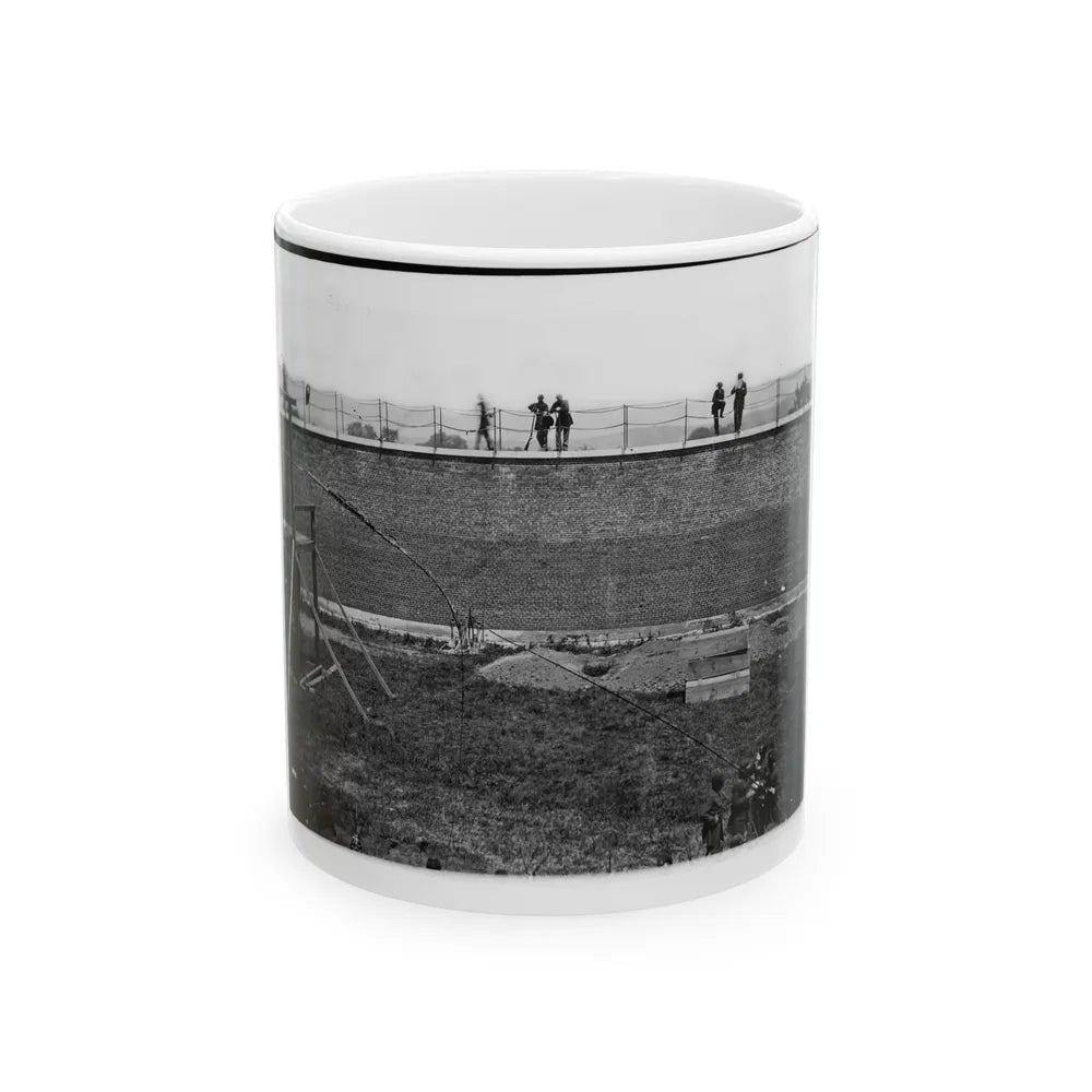 Washington, D.C. Coffins And Open Graves Ready For The Conspirators' Bodies At Right Of Scaffold (U.S. Civil War) White Coffee Mug-11oz-Go Mug Yourself